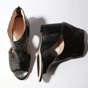 Patent leather snake print cut-out wedge booties